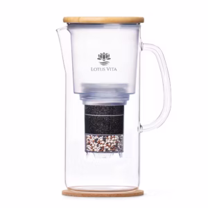 A side view of the ENYA water filter pitcher, showcasing its glass carafe, sustainable bamboo lid, and internal filter cartridge.